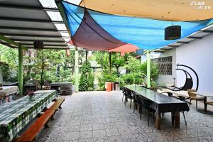 Restauracja lub miejsce do jedzenia w obiekcie Niuniu & Meng Ka Homestay