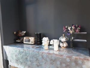 Zestaw do parzenia kawy i herbaty w obiekcie Niuniu & Meng Ka Homestay