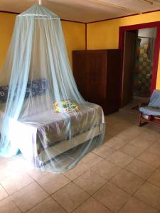 Tempat tidur dalam kamar di Fare OKAI