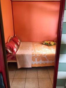Tempat tidur dalam kamar di Fare OKAI