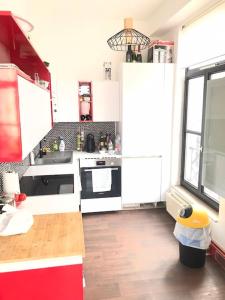 Kuchyň nebo kuchyňský kout v ubytování Appartement proche grand place