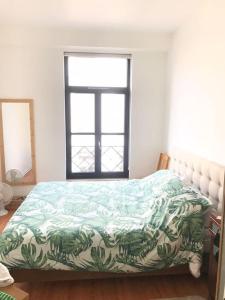 Postel nebo postele na pokoji v ubytování Appartement proche grand place