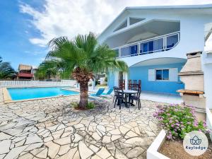 Villa Aldabra - 3 etoiles avec piscine à Saint-Leu tesisinde veya buraya yakın yüzme havuzu