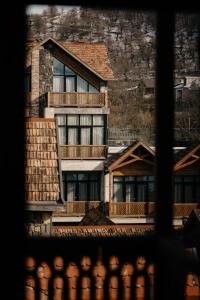 a view of a building from a window at Dilijani Tun Hotel & Restaurant in Dilijan