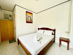 Postel nebo postele na pokoji v ubytování LA FIESTA RESORT