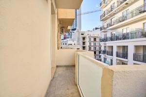 a view from the balcony of a building at 2 Bedroom Apartment St. Julians in St Julian's