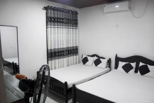 Säng eller sängar i ett rum på Penasara Holiday Home