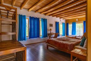 Postel nebo postele na pokoji v ubytování Nubra Ecolodge
