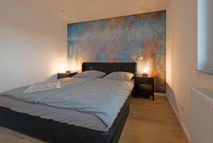 Postel nebo postele na pokoji v ubytování Casa Lorsch 2