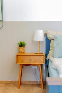 A bed or beds in a room at RothApartments'GARDEN