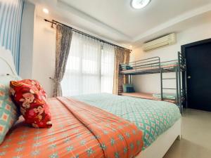 a bedroom with a bed and a bunk bed at Cheap Pool Villa Hauhin (3 BR 1 Lounge) European Kitchen in Hua Hin