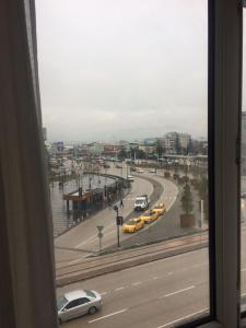 a view from a window of a street with taxis at KAYAPALI OTEL in Bursa