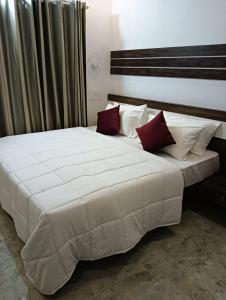 Posteľ alebo postele v izbe v ubytovaní Alora Cochin Villa