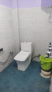 A bathroom at Badrinath Jbk by Prithvi Yatra Hotel