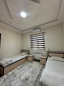 Cama o camas de una habitación en HOTEL ARAL