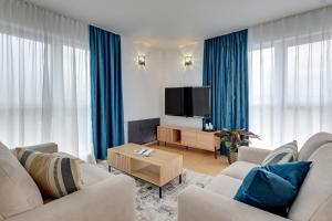 O zonă de relaxare la Nad Stawem by Downtown Apartments