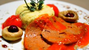 a plate of food with meat and vegetables on it at VOLLEY HOTEL ANKARA in Ankara