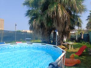 Bazén v ubytování DiVino Appartamenti Vista Mare nebo v jeho okolí