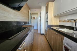 Nhà bếp/bếp nhỏ tại Apartamento con piscina cerca de la playa