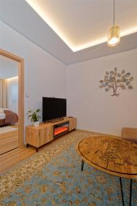 TV a/nebo společenská místnost v ubytování Villa Holiday Hevlín
