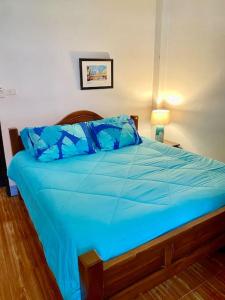 Ein Bett oder Betten in einem Zimmer der Unterkunft Bahamian Grove House