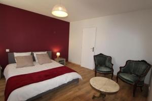 Ένα ή περισσότερα κρεβάτια σε δωμάτιο στο Petit appartement confortable