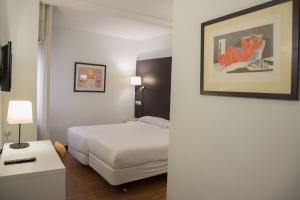 Postel nebo postele na pokoji v ubytování Hotel Delta