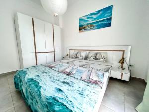 Posteľ alebo postele v izbe v ubytovaní Sea Pleasure Apartment II
