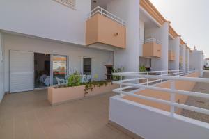a view of the balcony of a building at Aldeamento Turistico Aldeia da Galé in Albufeira