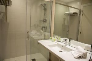 Koupelna v ubytování Hotel Delta