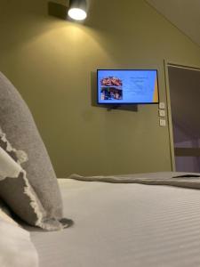 Posteľ alebo postele v izbe v ubytovaní Logis Hôtel Altitude et Spa Pierre-Percée