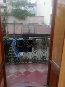 an outside view of a balcony with a wrought iron railing at Firenze in Bnb in Florence