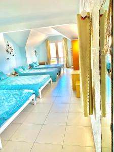 Letto o letti in una camera di Gold's House