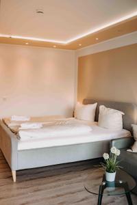 Postel nebo postele na pokoji v ubytování Haus am See HS 721 B