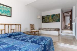 En eller flere senge i et værelse på Villa Sea view on the rocks