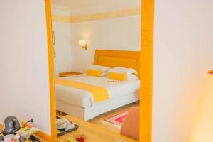 Ένα ή περισσότερα κρεβάτια σε δωμάτιο στο Hotel Timoulay and Spa Agadir