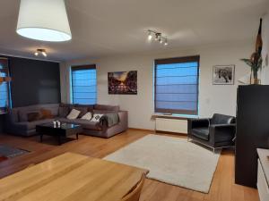 A seating area at 8 person farmhouse with sauna