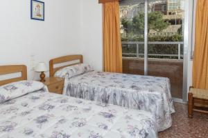 Posteľ alebo postele v izbe v ubytovaní Florazar 2, Vii-2-A + 30 fotografií