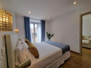 Postel nebo postele na pokoji v ubytování APARTAMENTOS SAN ANDRES
