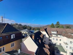 an aerial view of a city with buildings at Penthouse über den Dächern Badenweilers in Badenweiler
