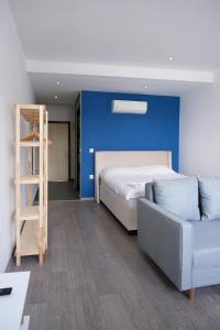 Postel nebo postele na pokoji v ubytování Kordon Apartment