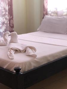 Posteľ alebo postele v izbe v ubytovaní Mangaza Mtwapa Luxury Apartment B1M