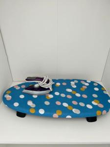 a dog bed with polka dots on a white background at Stunning 1-bedroom annexe flat with own entrance near London in Ewell