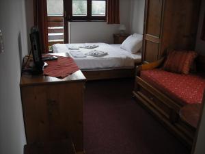 Łóżko lub łóżka w pokoju w obiekcie Sport hotel POMI
