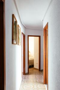 Posteľ alebo postele v izbe v ubytovaní Almar Collection Cullera AT