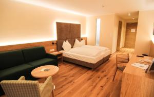 A bed or beds in a room at Hotel Regina