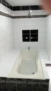 Een badkamer bij CASA HOTEL BOTERO