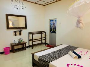 Letto o letti in una camera di Lucky Villa Sigiriya