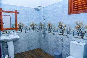 Vonios kambarys apgyvendinimo įstaigoje Breeze Blows Inn