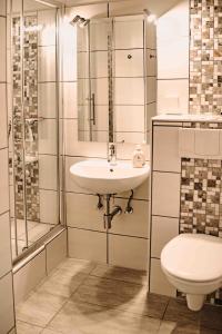Ein Badezimmer in der Unterkunft Haus Vier Jahreszeiten am See HS 473